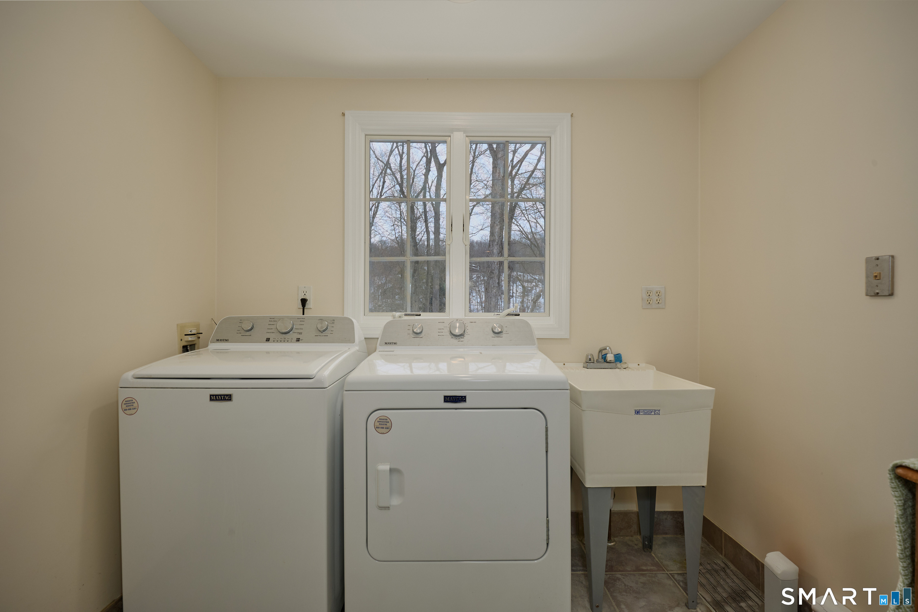 41 Old Mill Road Ridgefield, CT 06877 - Photo 27 of 33 a utility room with dryer and washer