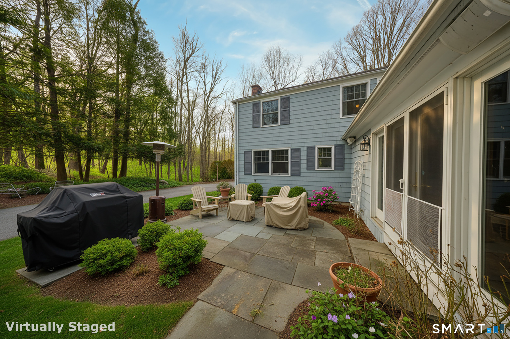 41 Old Mill Road Ridgefield, CT 06877 - Photo 32 of 33 a view of a patio with couches table and chairs and potted plants