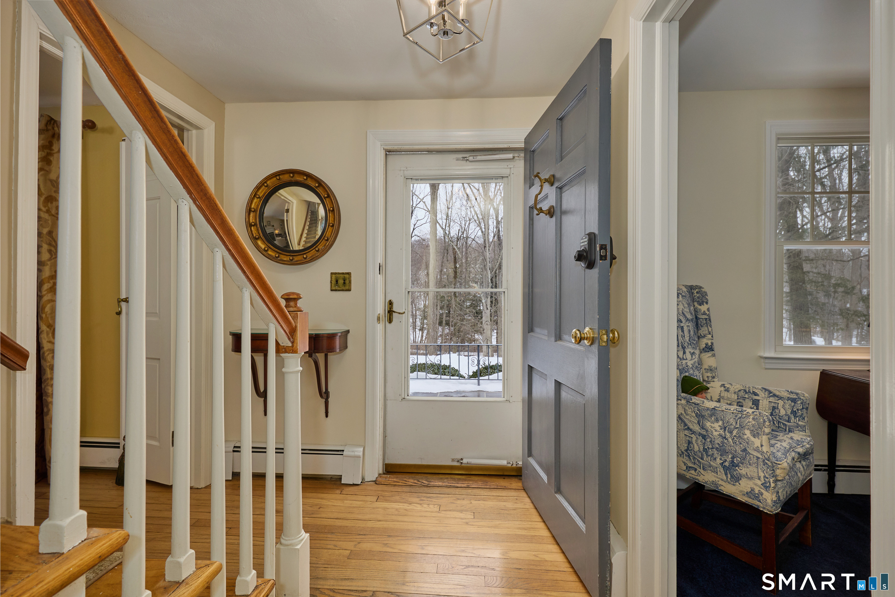 41 Old Mill Road Ridgefield, CT 06877 - Photo 4 of 33 a view of entryway and hall with wooden floor