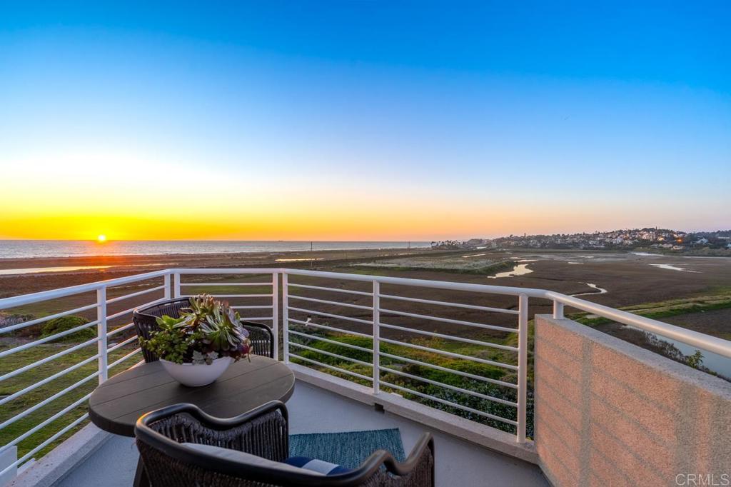 170 Solana Point Circle Solana Beach, CA 92075 - Photo 16 of 68 a view of a balcony with chair and potted plants