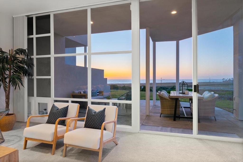 170 Solana Point Circle Solana Beach, CA 92075 - Photo 31 of 68 a balcony with furniture and a potted plant