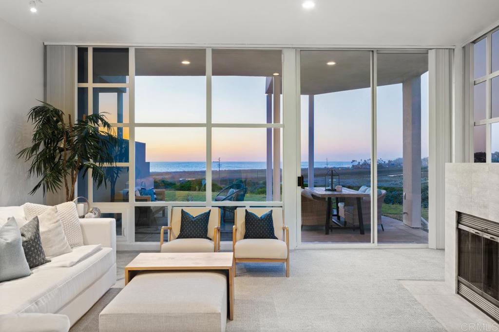 170 Solana Point Circle Solana Beach, CA 92075 - Photo 35 of 68 a living room with furniture and a large window
