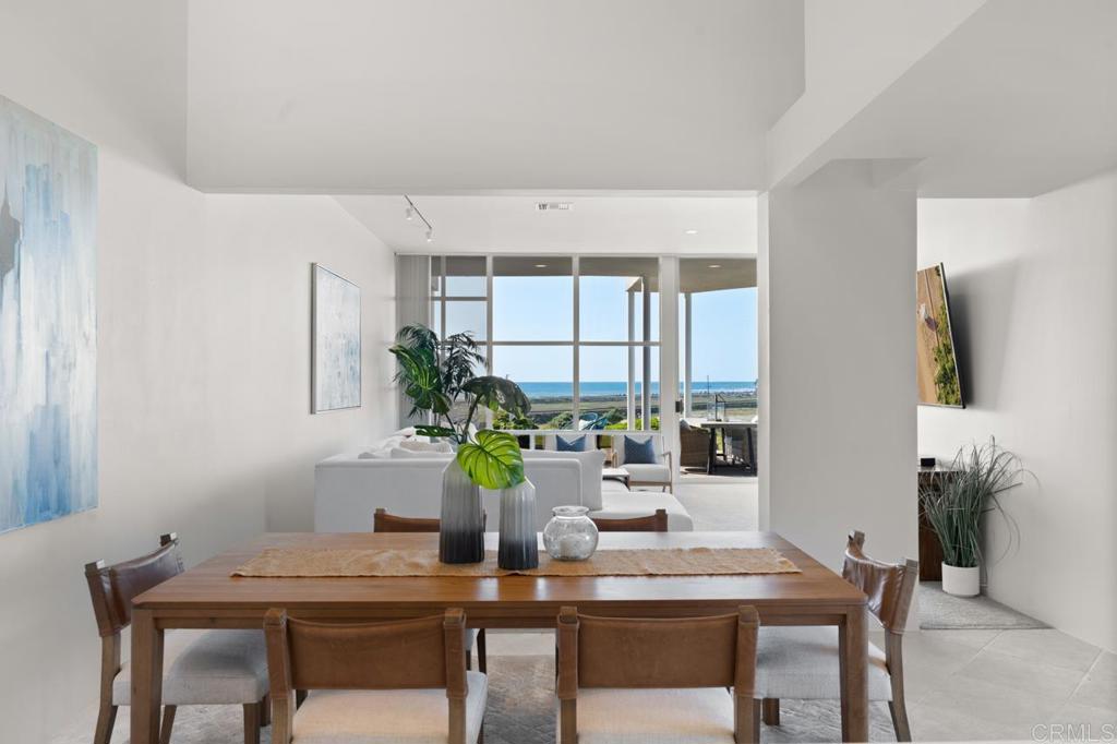 170 Solana Point Circle Solana Beach, CA 92075 - Photo 41 of 68 a dining room with furniture and window