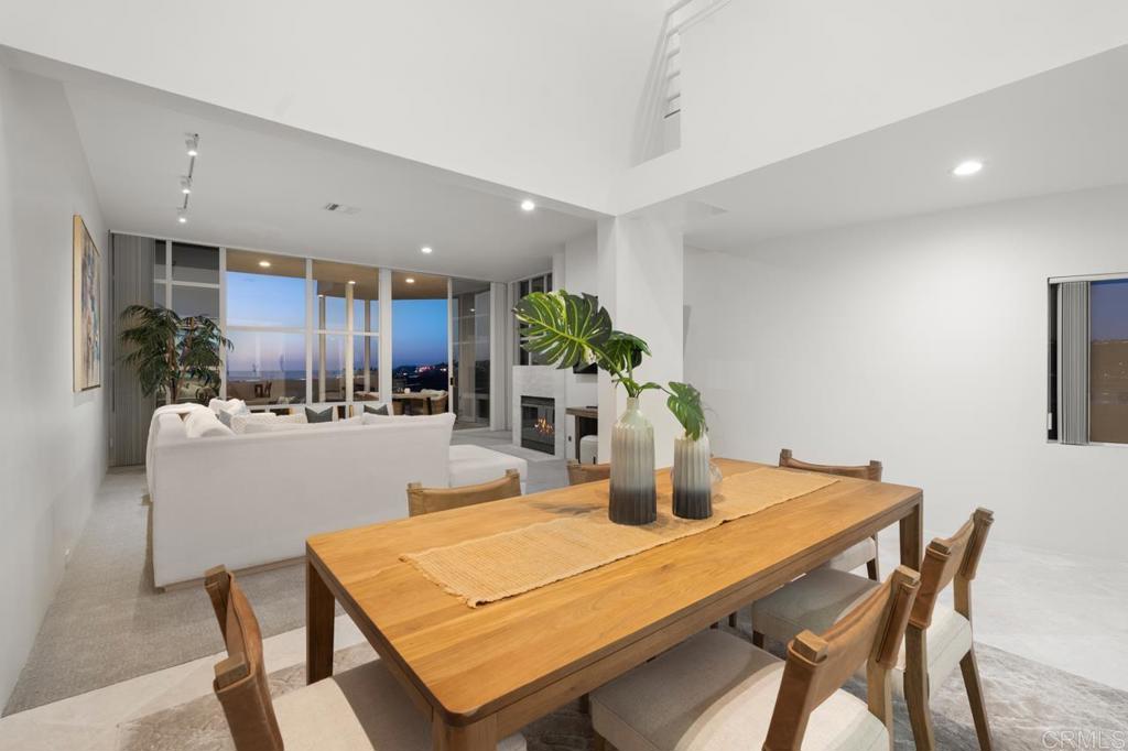 170 Solana Point Circle Solana Beach, CA 92075 - Photo 43 of 68 a dining room with furniture and wooden floor