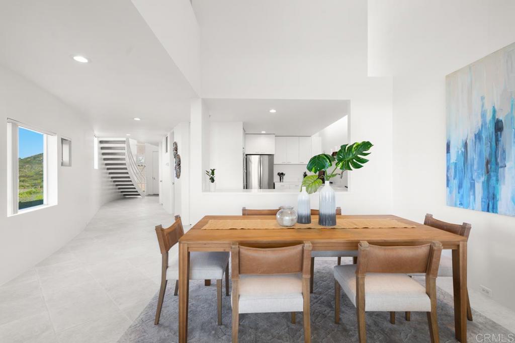 170 Solana Point Circle Solana Beach, CA 92075 - Photo 44 of 68 a dining room with furniture and window