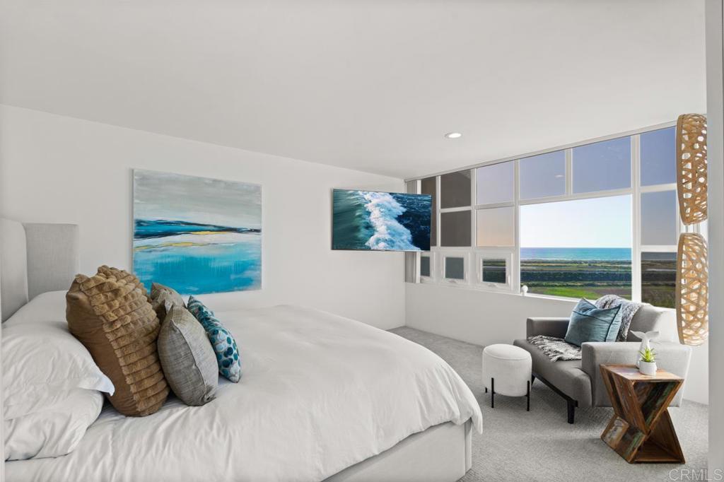 170 Solana Point Circle Solana Beach, CA 92075 - Photo 53 of 68 a bedroom with a bed and a large window