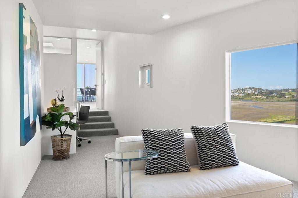 170 Solana Point Circle Solana Beach, CA 92075 - Photo 59 of 68 a bedroom with furniture and a potted plant