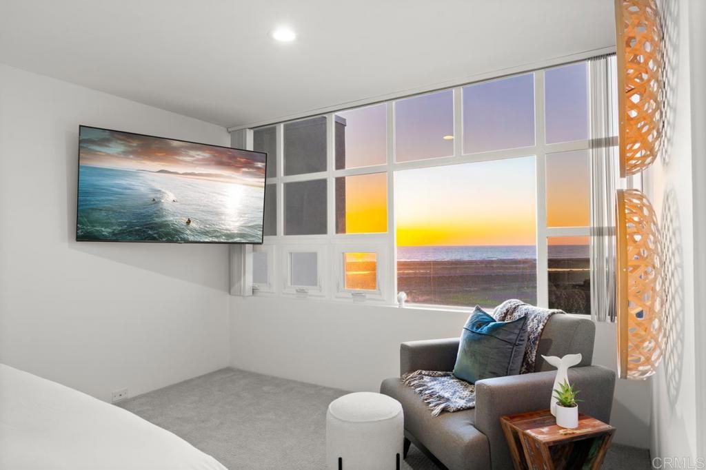 170 Solana Point Circle Solana Beach, CA 92075 - Photo 62 of 68 a living room with furniture and a flat screen tv