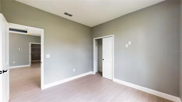 a bathroom with a shower and a tub