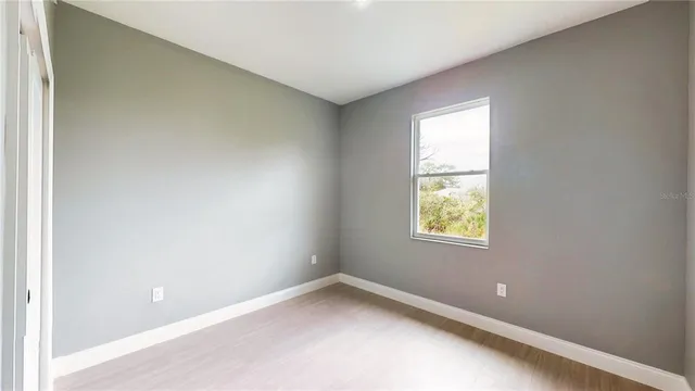 an empty room with windows