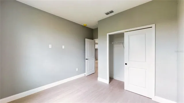 an empty room with closet