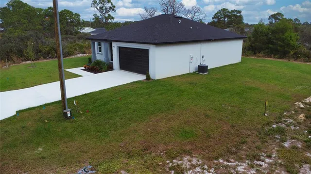 a house with garden in front of it