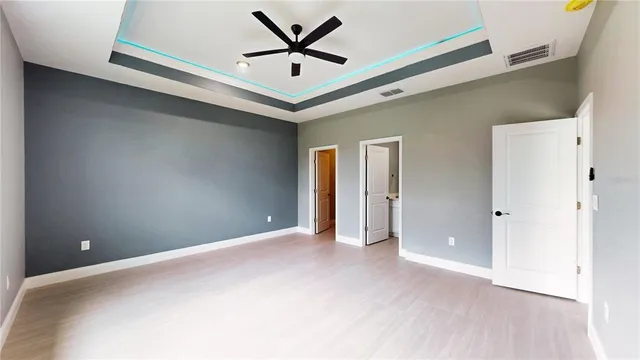 a bathroom with a shower and toilet