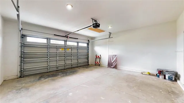a view of a room with equipment and a ceiling fan