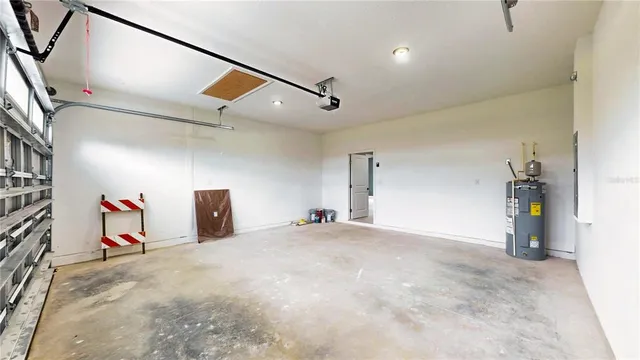 a view of hallway with stairs and a chandelier