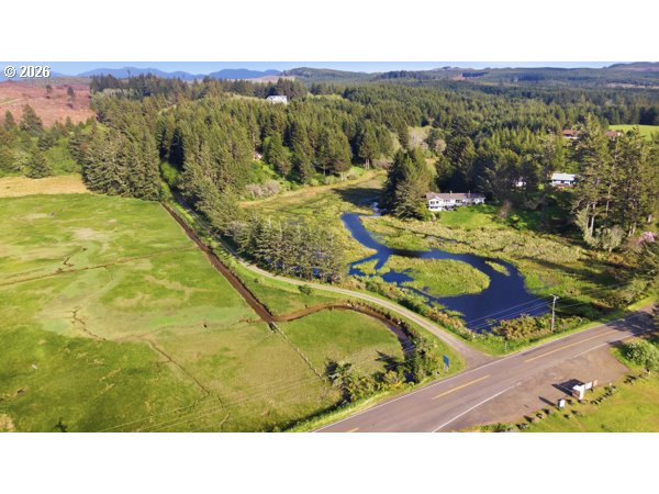 4000 Hamm Road Tillamook, OR 97141 - Photo 4 of 15 a view of a swimming pool with a yard