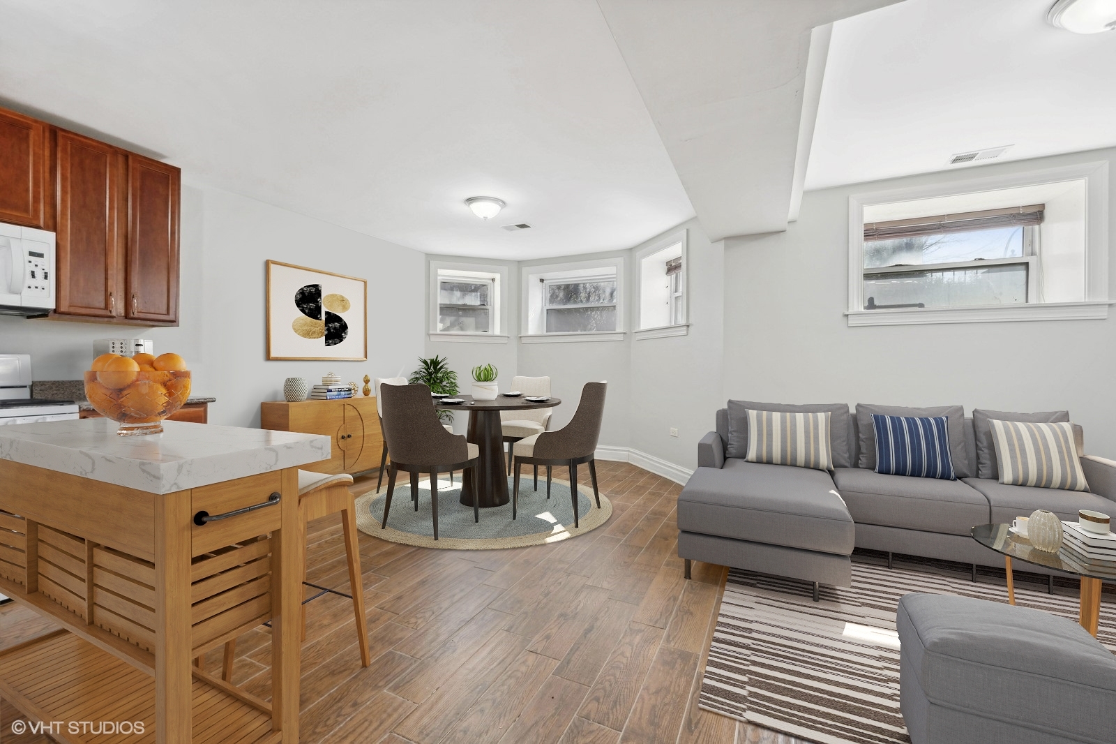 2256 West Adams Street, Unit G Chicago, IL 60612 - Photo 2 of 11 a living room with furniture and wooden floor