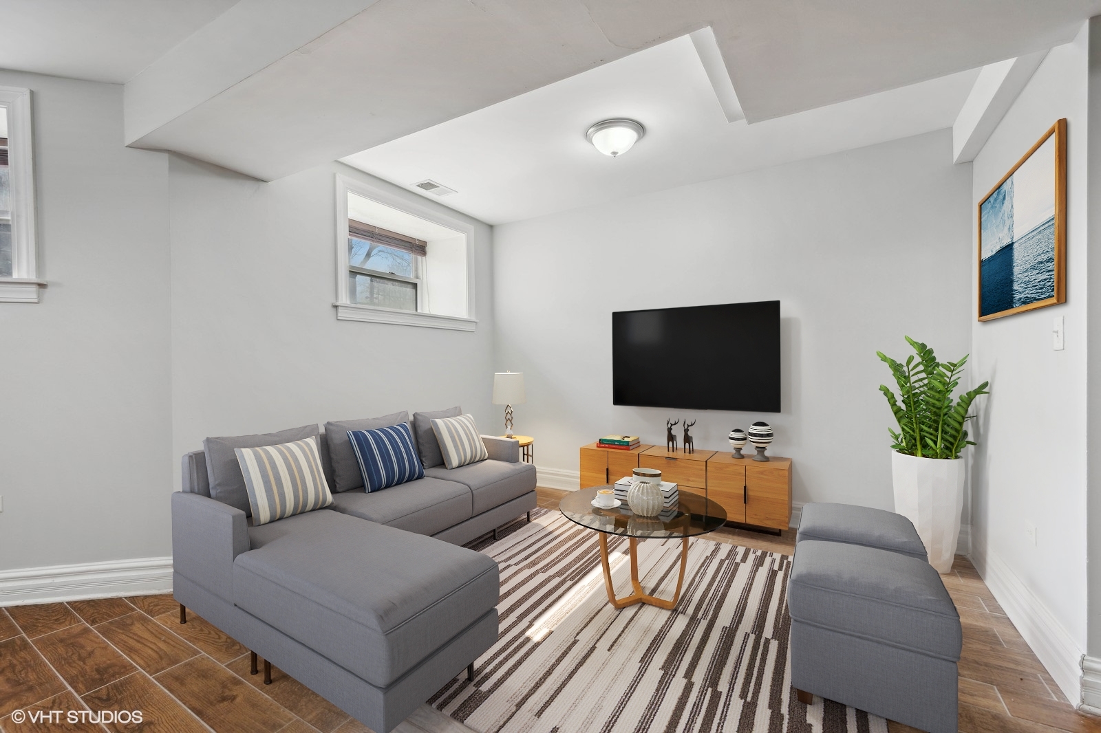 2256 West Adams Street, Unit G Chicago, IL 60612 - Photo 6 of 11 a living room with furniture and a flat screen tv