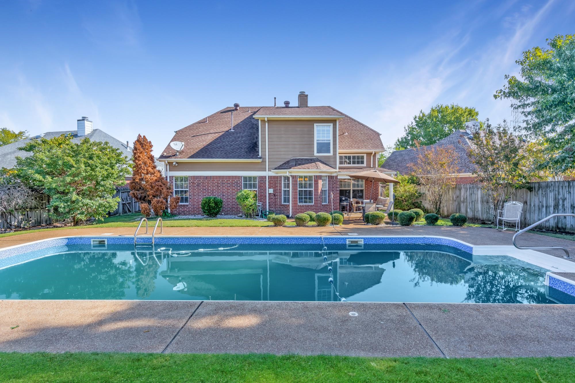 8599 Brer Fox Cove Memphis, TN 38018 - Photo 1 of 25 a front view of house with yard