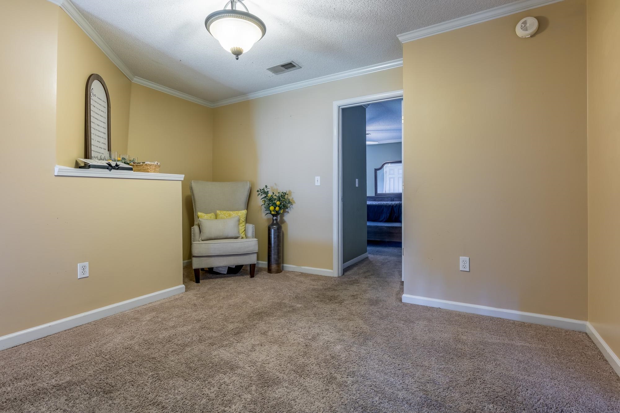 8599 Brer Fox Cove Memphis, TN 38018 - Photo 15 of 25 a view of a room with furniture and closet