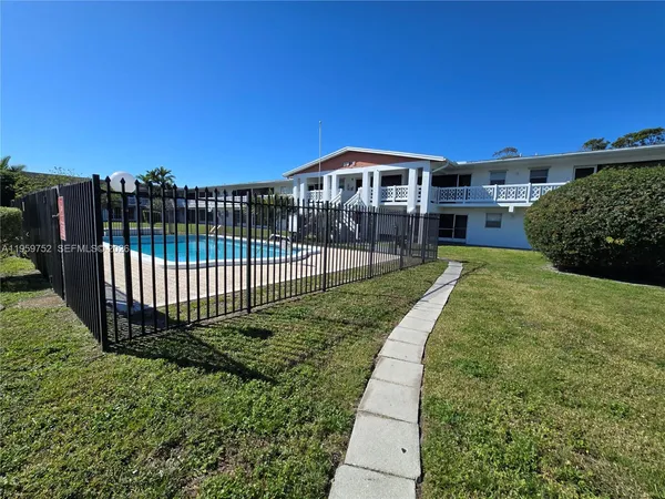 a view of a garden with a small yard