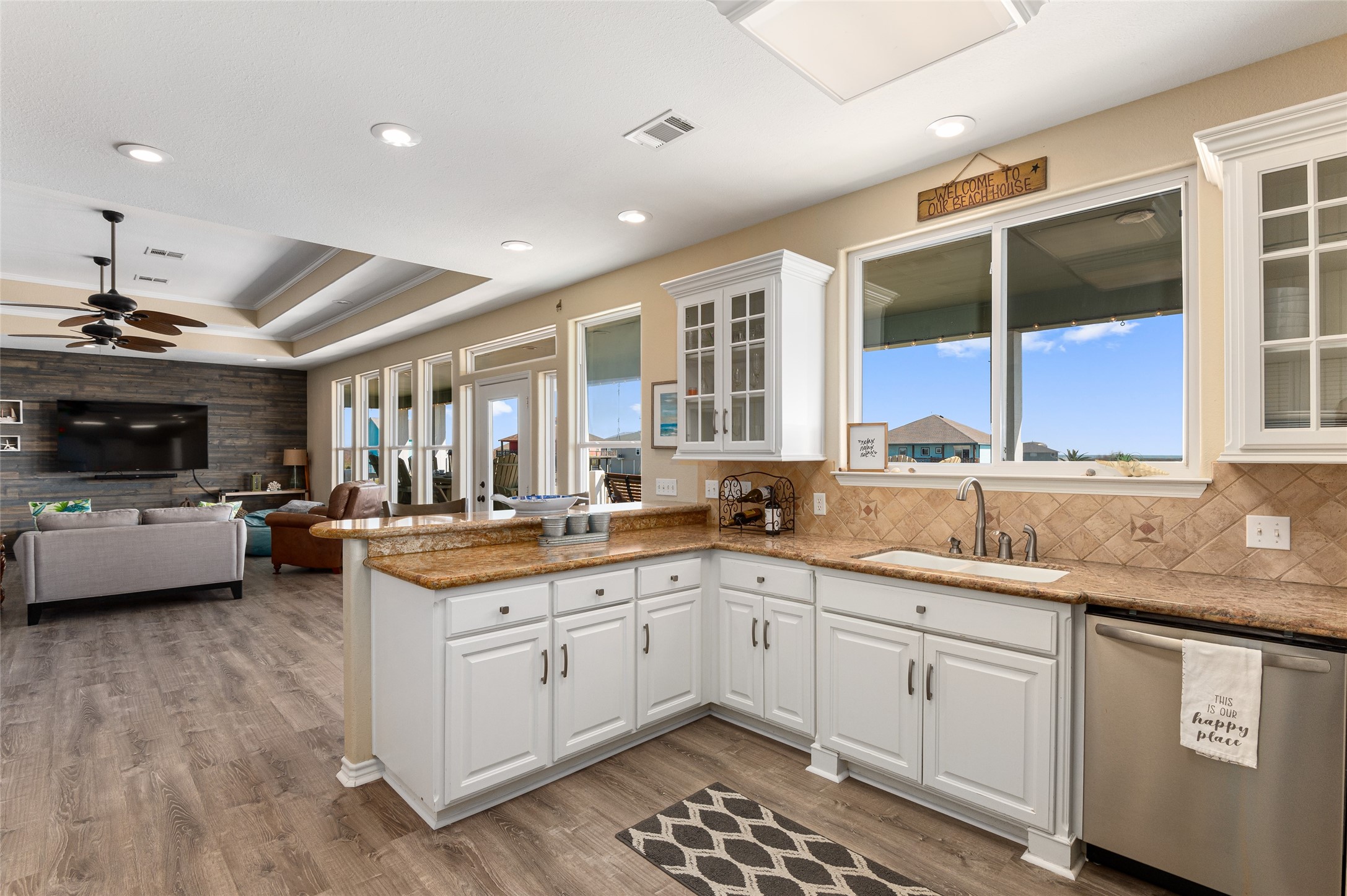 200 Mobile Crystal Beach, TX 77650 - Photo 18 of 49 a kitchen with a sink stove and cabinets
