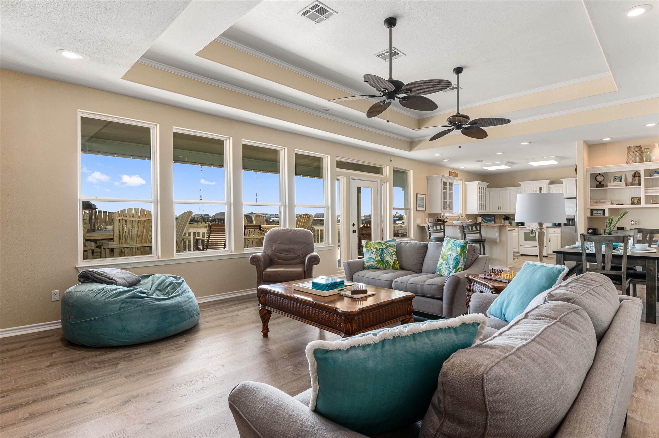 200 Mobile Crystal Beach, TX 77650 - Photo 25 of 49 a living room with furniture a ceiling fan and a large window