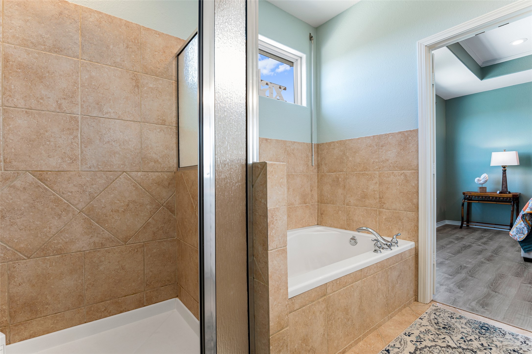 200 Mobile Crystal Beach, TX 77650 - Photo 32 of 49 a bathroom with a bathtub and shower
