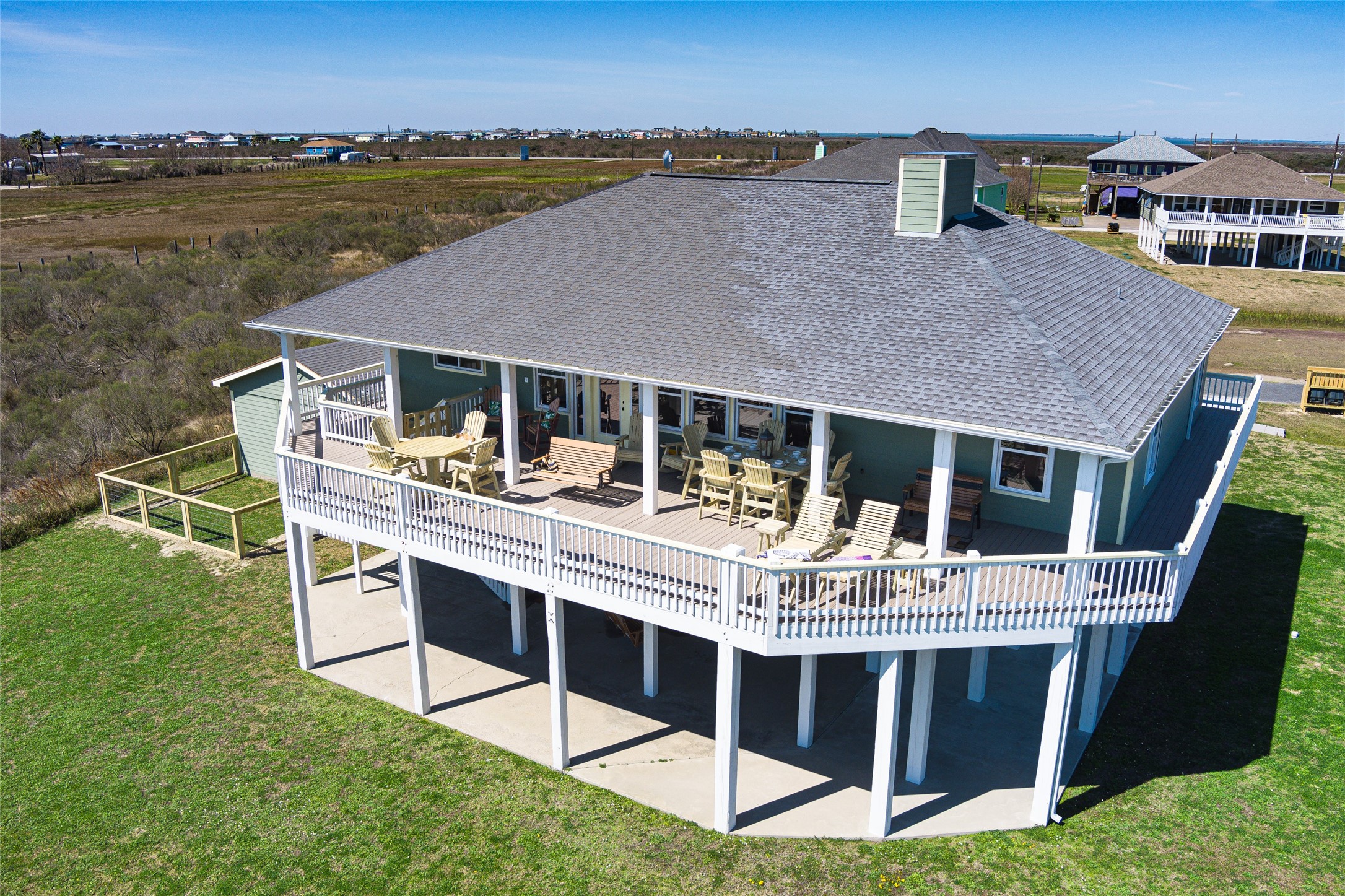 200 Mobile Crystal Beach, TX 77650 - Photo 6 of 49 a view of a house with pool and chairs