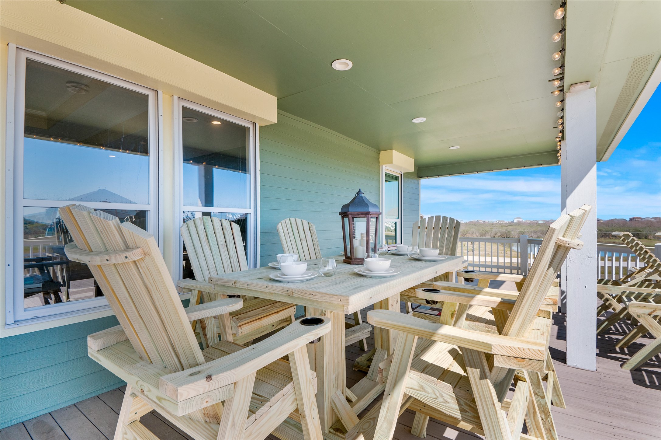 200 Mobile Crystal Beach, TX 77650 - Photo 7 of 49 a view of a dining room with furniture window and wooden floor