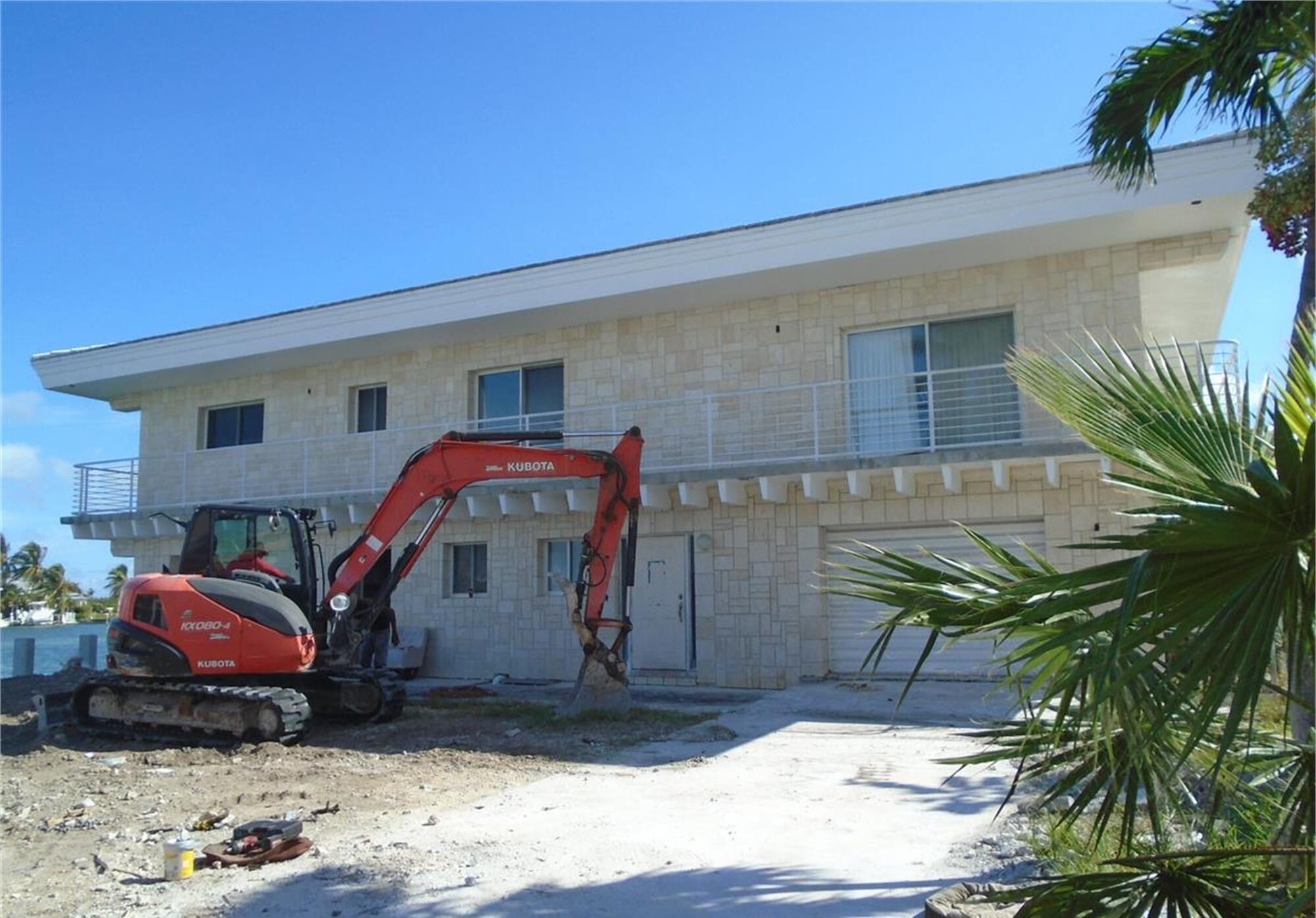 820 10th Street Key Colony Beach, FL 33051 - Photo 3 of 3 a front view of a house with garden