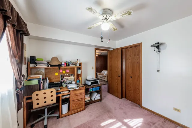 a view of a workspace with furniture
