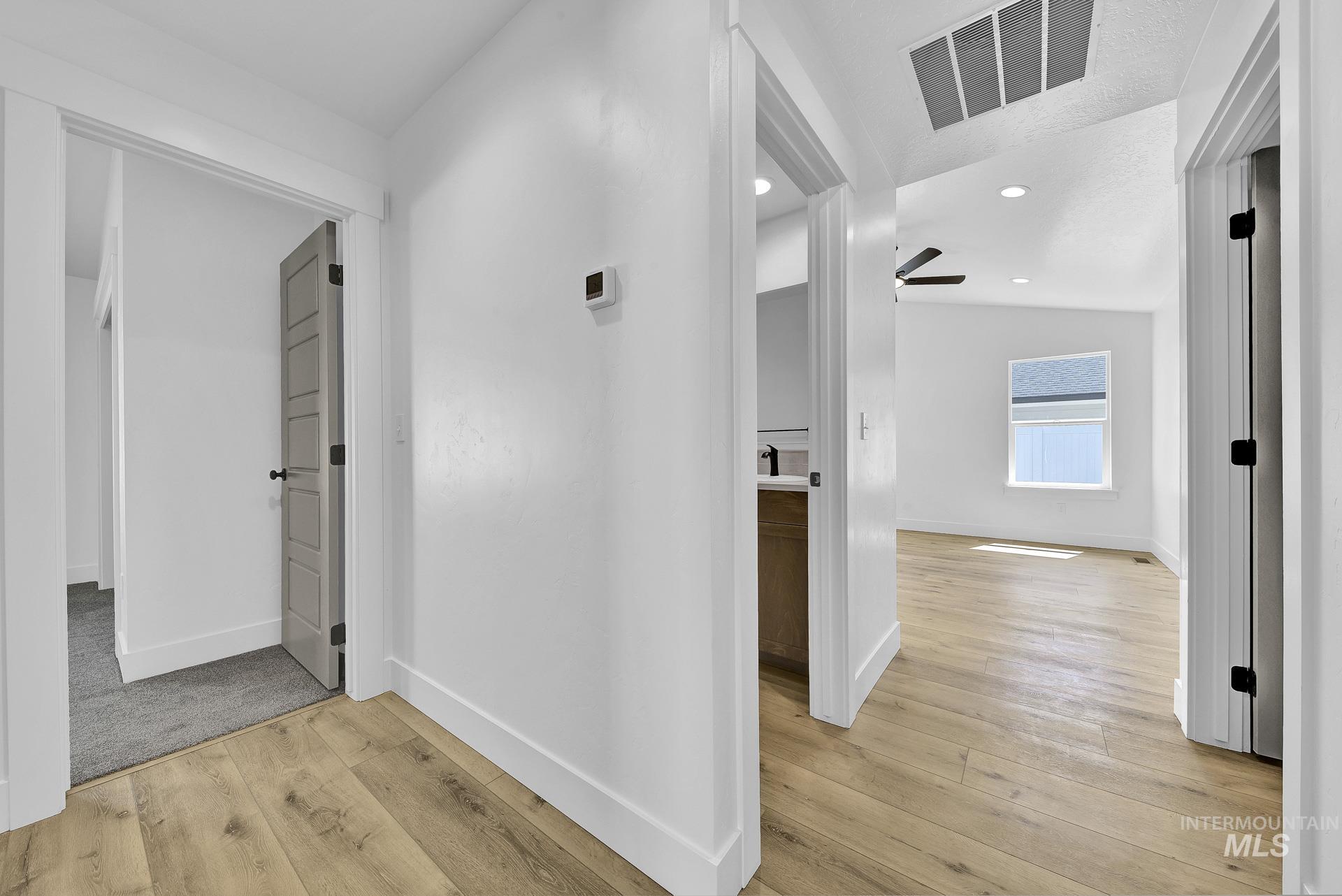 1162 Velvet Loop Wilder, ID 83676 - Photo 15 of 31 Hall featuring light wood finished floors and recessed lighting