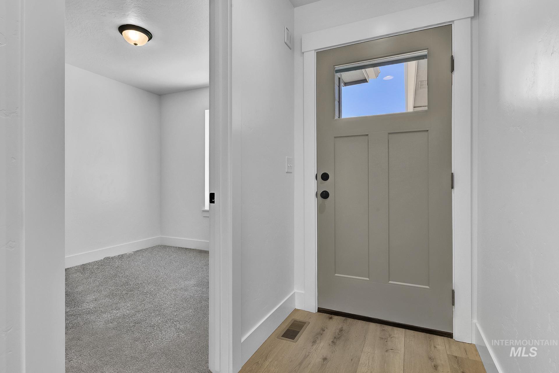 1162 Velvet Loop Wilder, ID 83676 - Photo 24 of 31 Entryway featuring baseboards and light wood-style floors