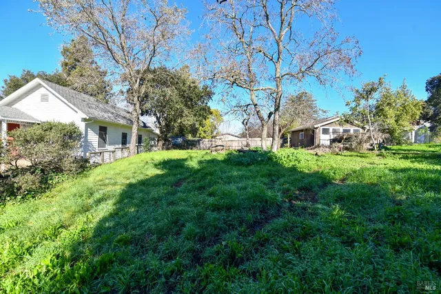 a house view with a garden space