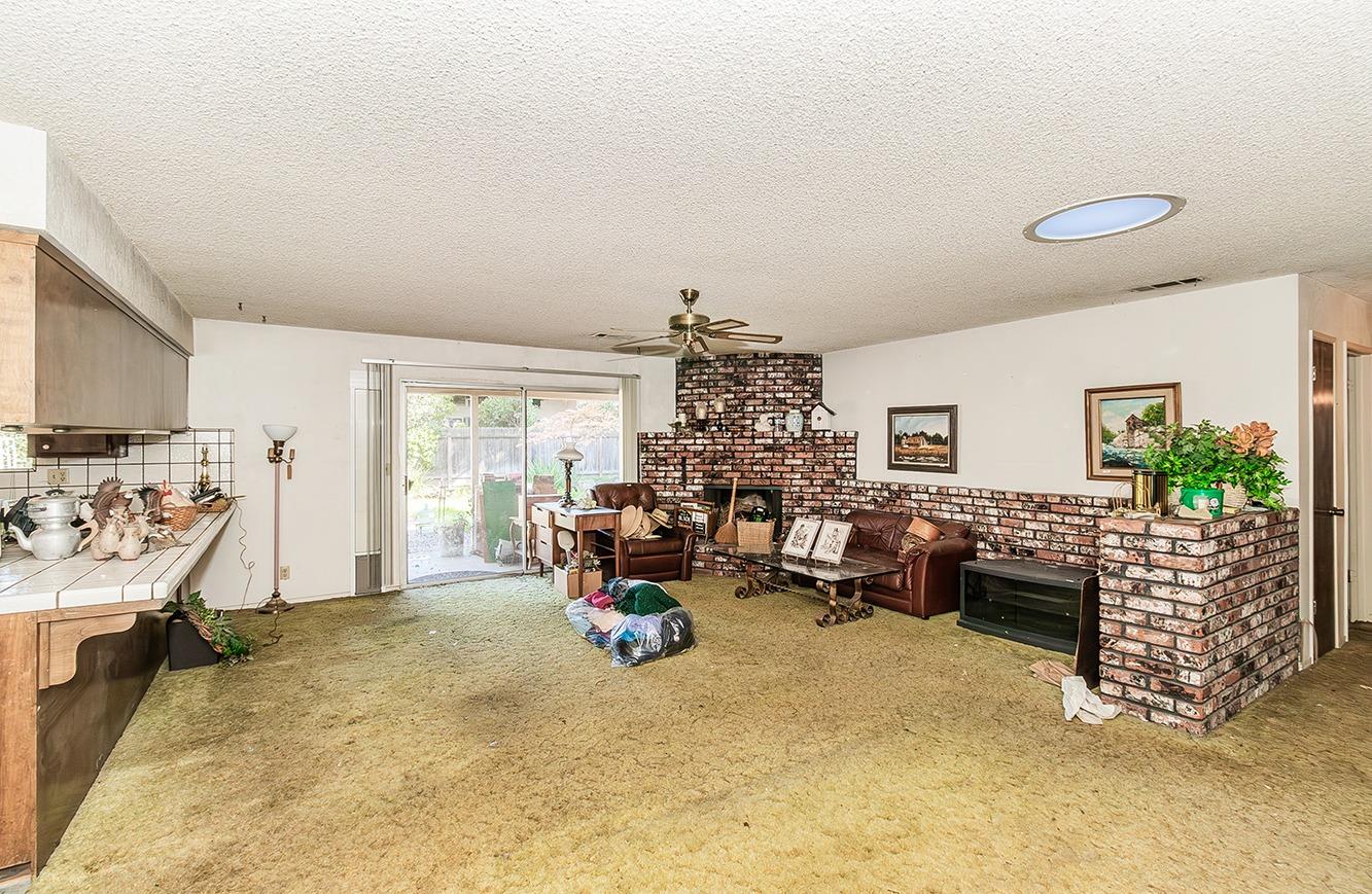 2501 Ashcroft Avenue Clovis, CA 93611 - Photo 6 of 24 a bedroom with furniture and a large window