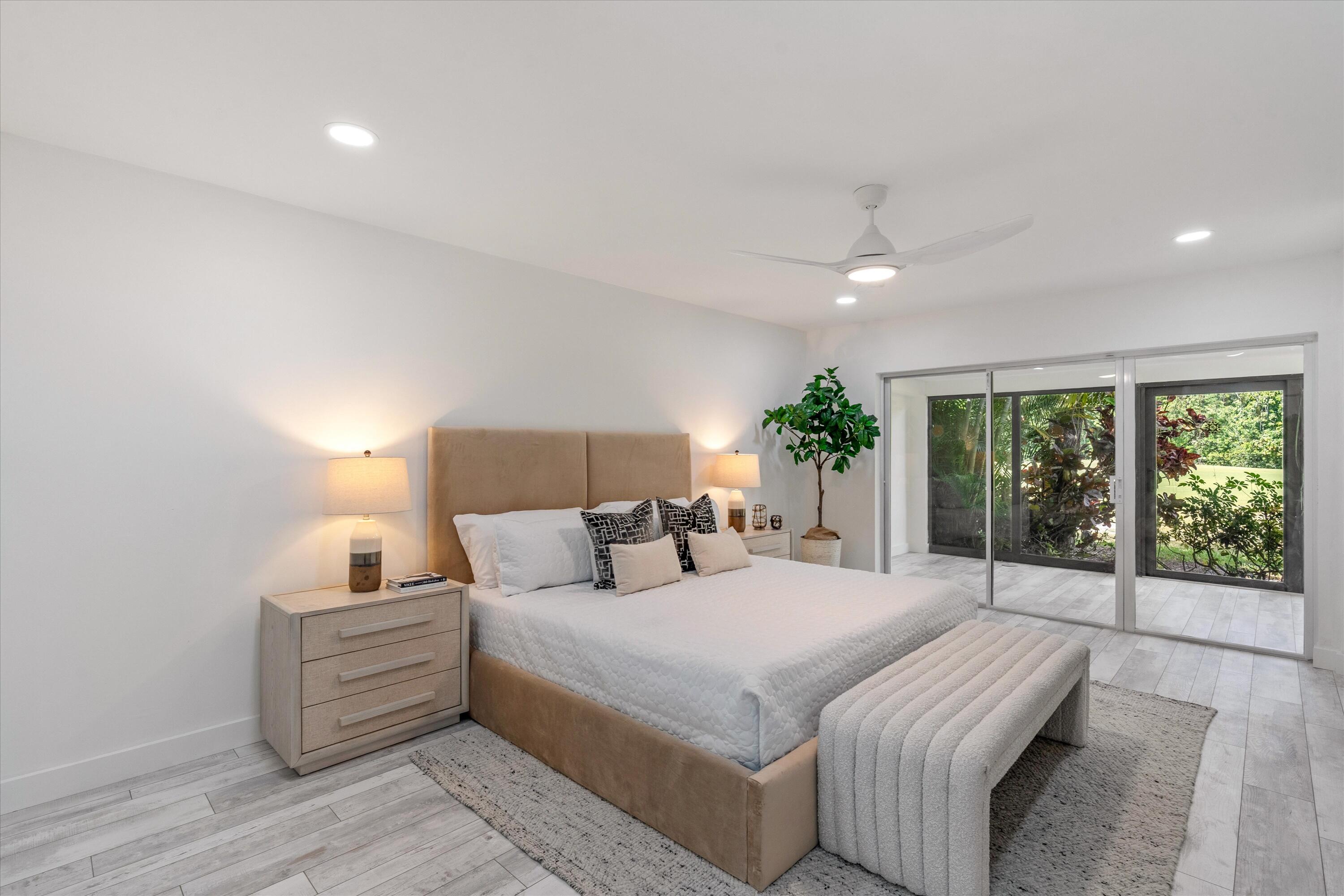 9207 Pecky Cypress Lane, Unit 9B Boca Raton, FL 33428 - Photo 17 of 29 Primary Bedroom