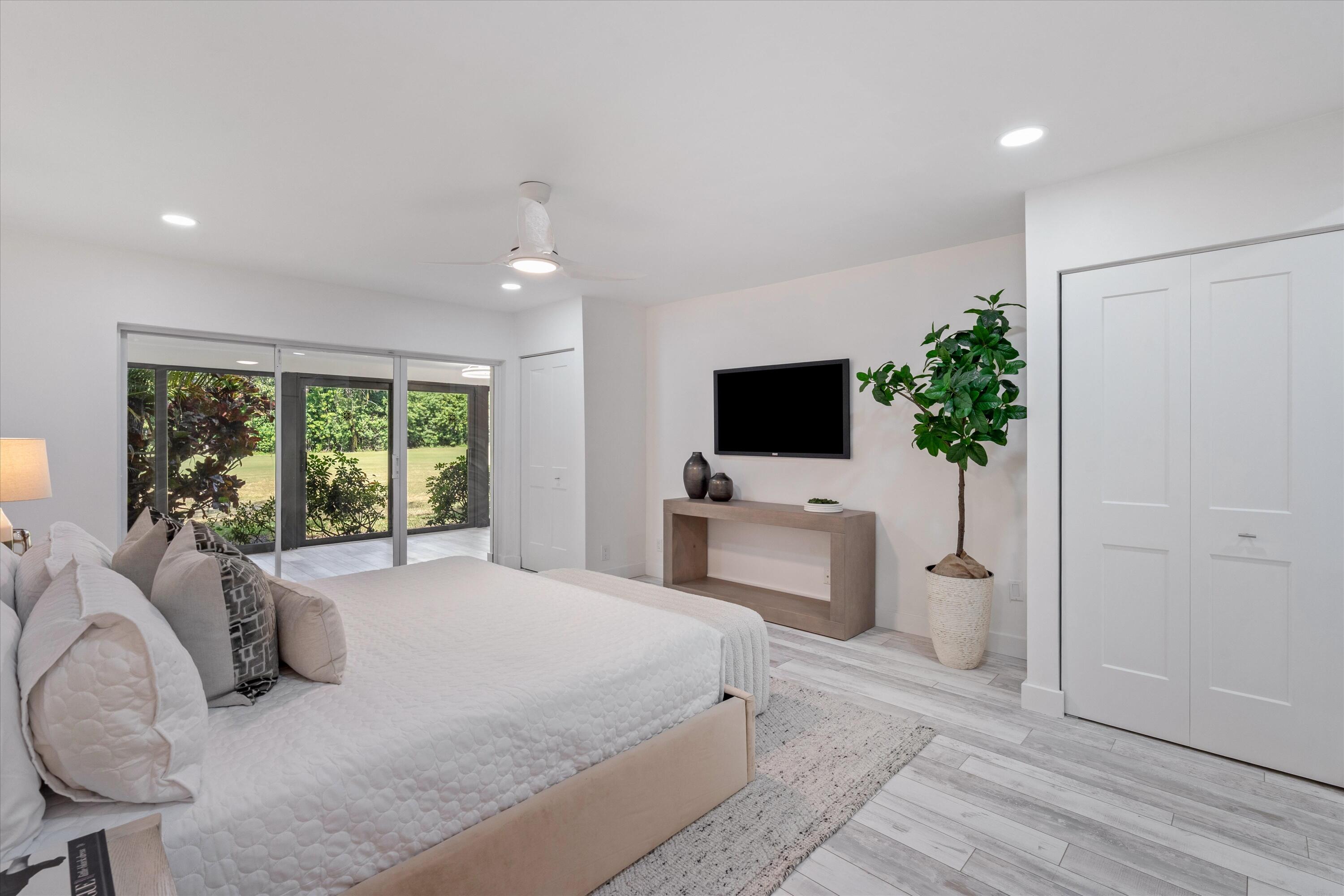 9207 Pecky Cypress Lane, Unit 9B Boca Raton, FL 33428 - Photo 18 of 29 Primary Bedroom