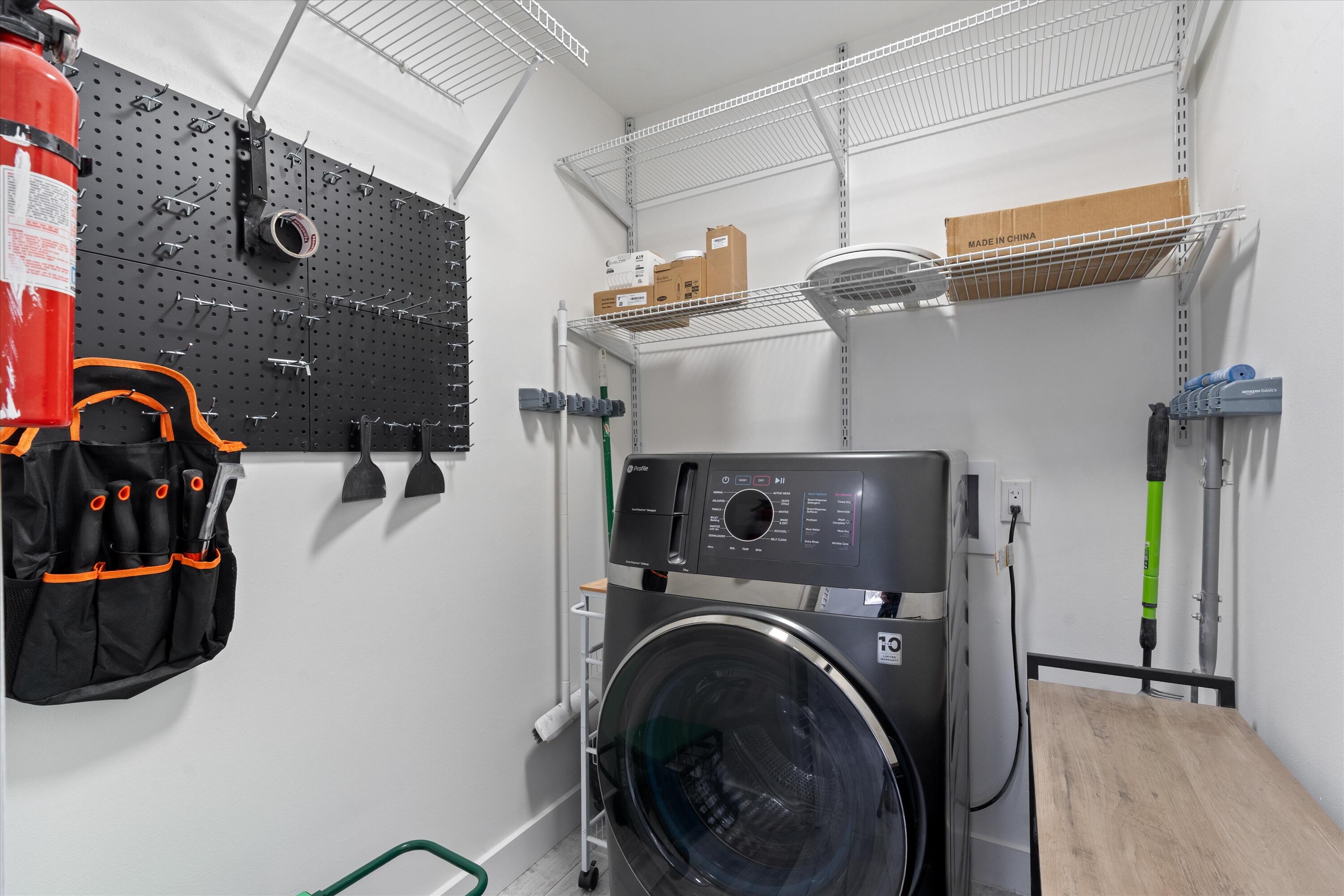 9207 Pecky Cypress Lane, Unit 9B Boca Raton, FL 33428 - Photo 26 of 29 Laundry/Utility Room