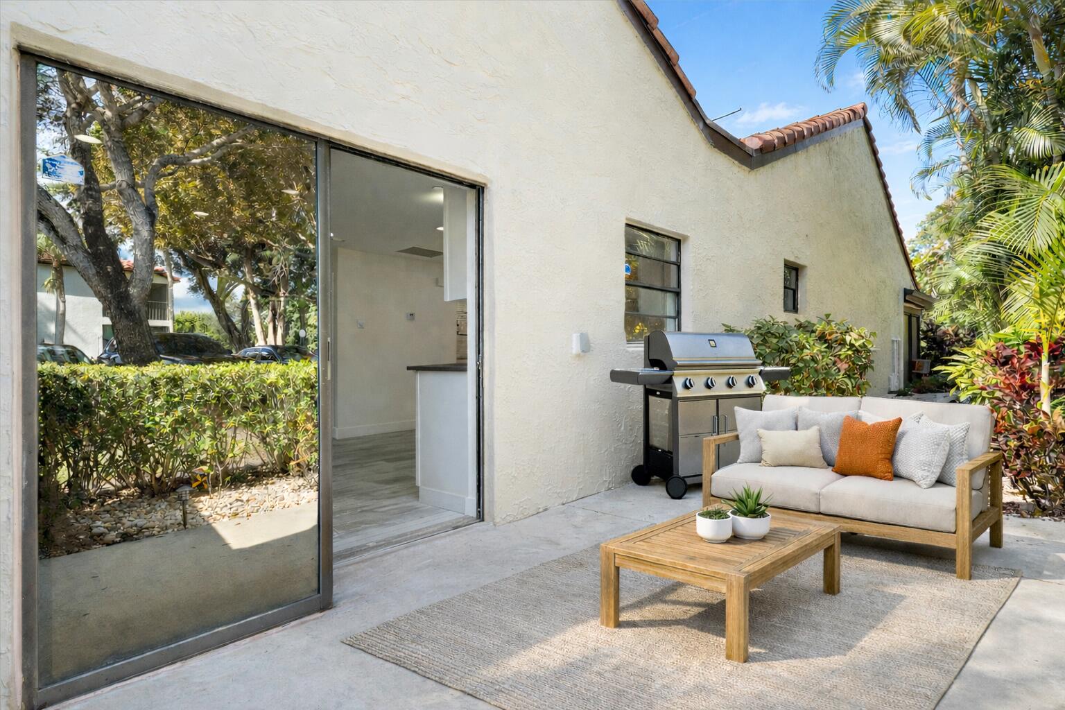9207 Pecky Cypress Lane, Unit 9B Boca Raton, FL 33428 - Photo 27 of 29 Outdoor Patio Virtually Staged