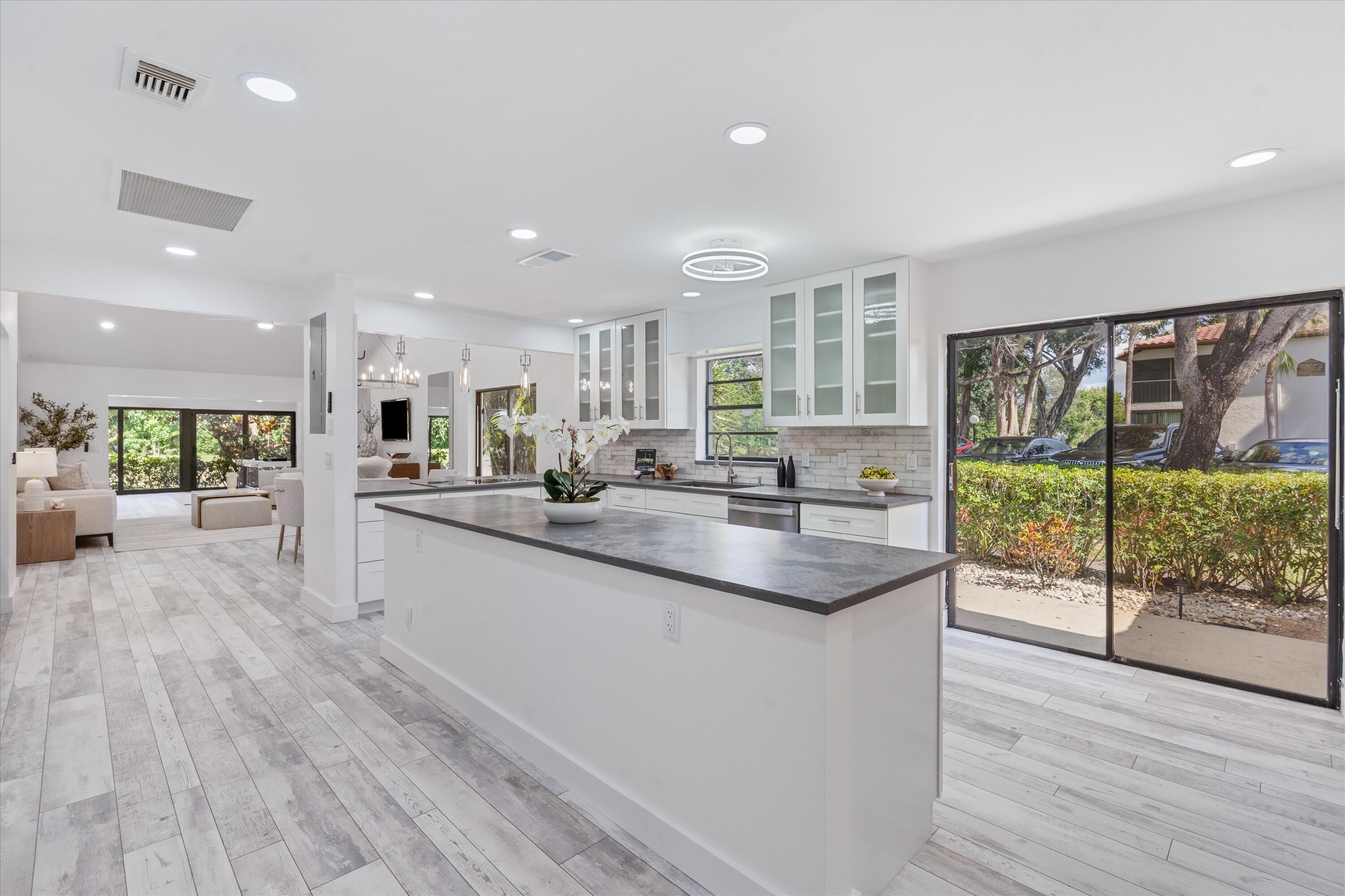 9207 Pecky Cypress Lane, Unit 9B Boca Raton, FL 33428 - Photo 8 of 29 Kitchen Area