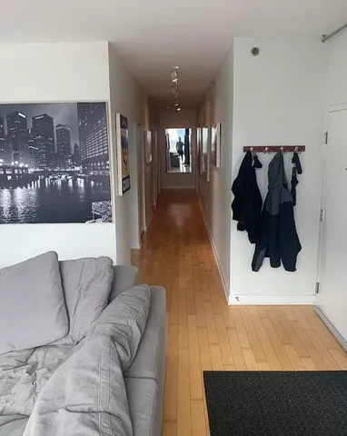 a living room with furniture and a rug