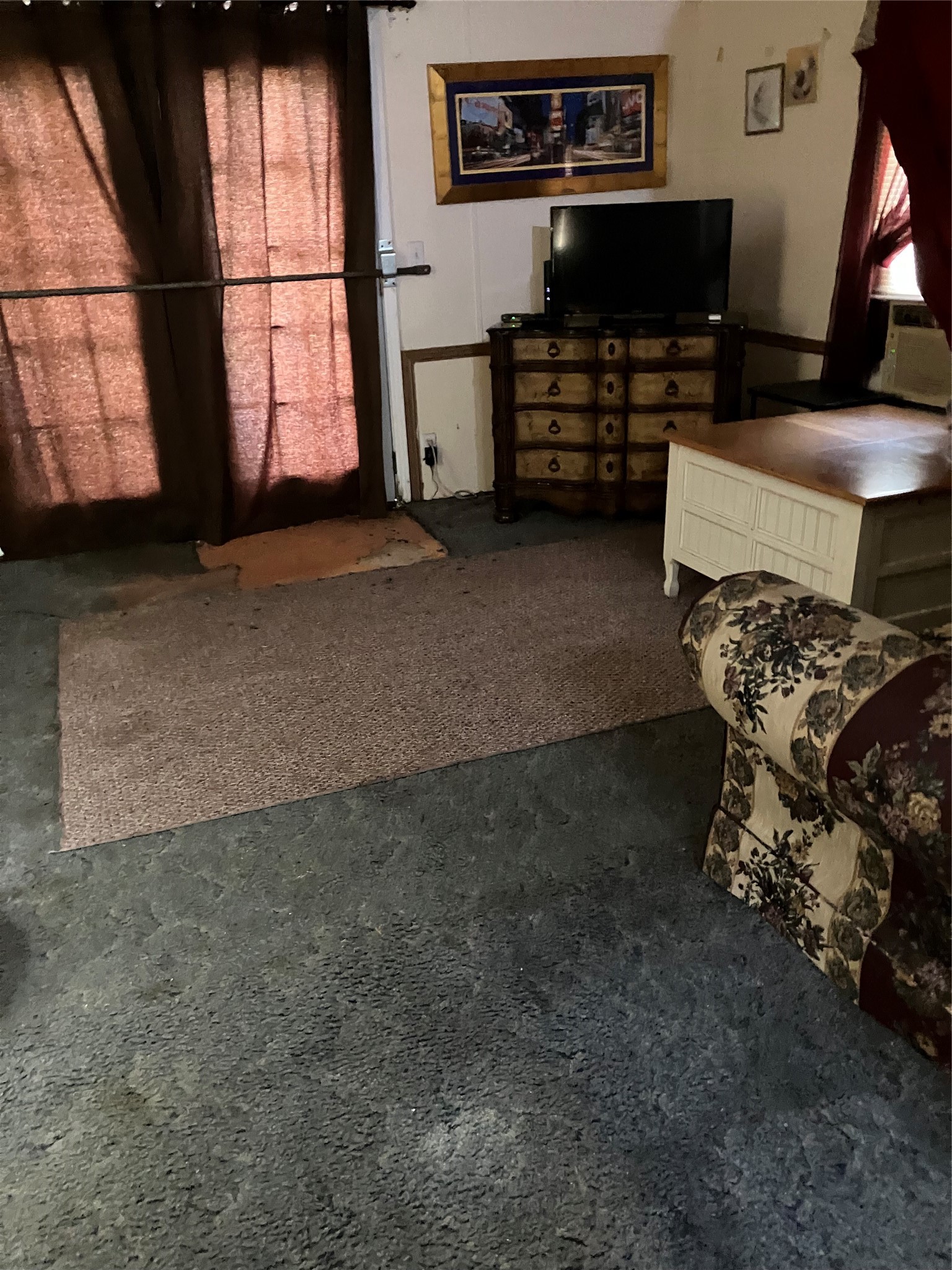 20923 Stevens Street New Caney, TX 77357 - Photo 9 of 20 a living room with furniture a flat screen tv and a window