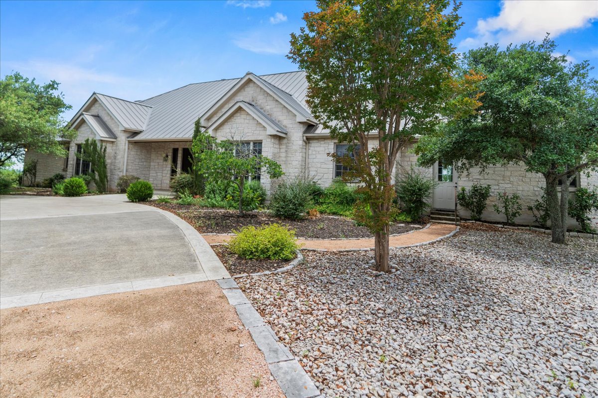 167 Wimberley Ranch Drive Wimberley, TX 78676 - Photo 30 of 40 a view of a house with a yard