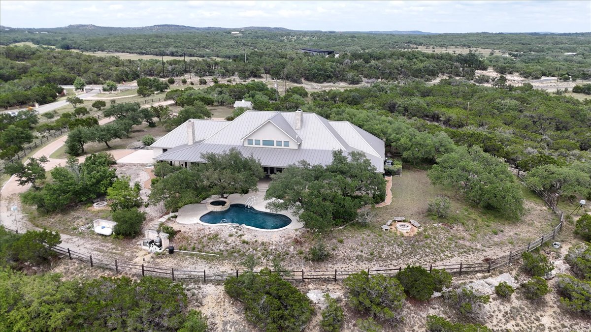 167 Wimberley Ranch Drive Wimberley, TX 78676 - Photo 40 of 40 an aerial view of a house with a yard