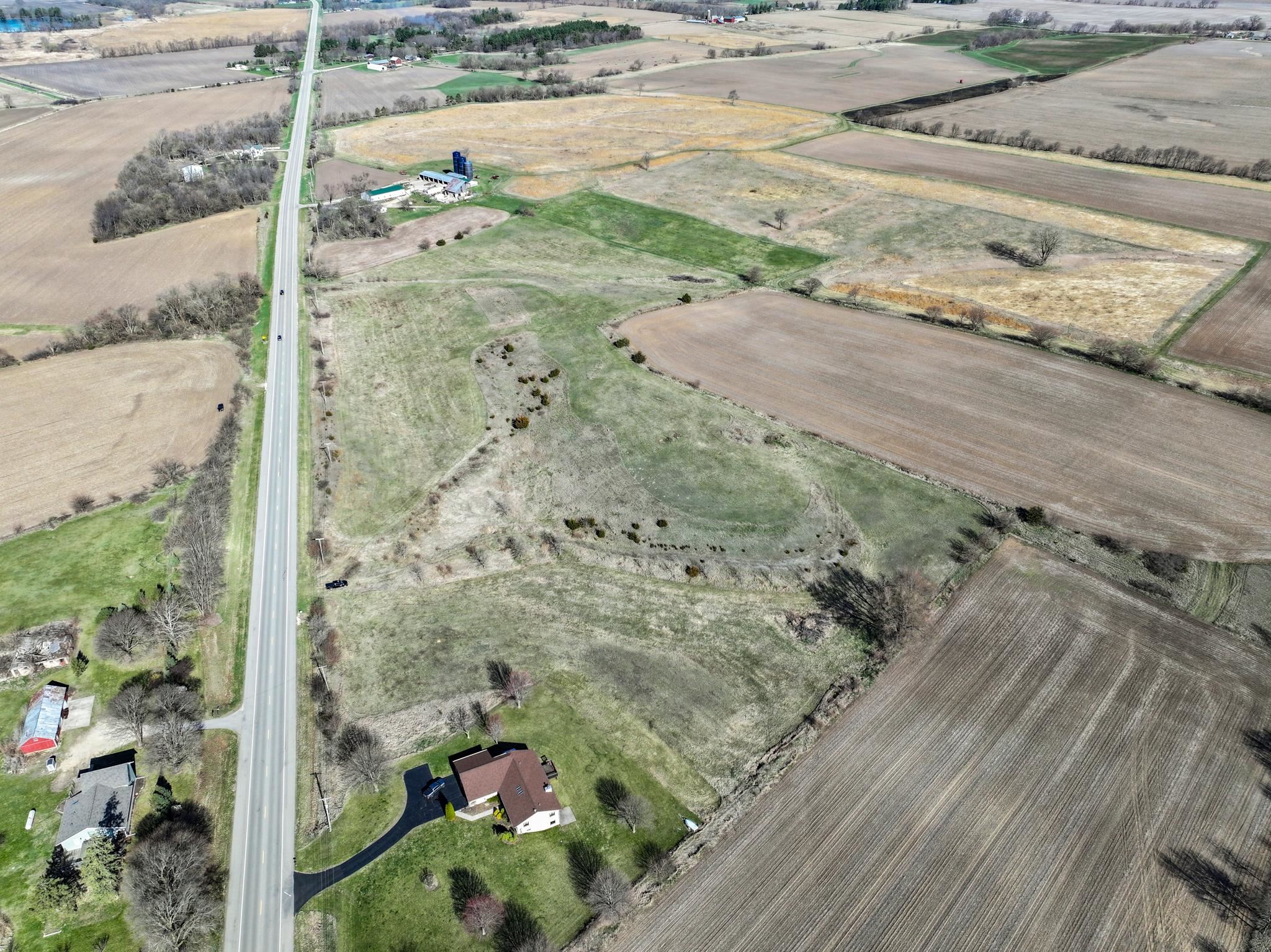 88-xx 88-xx Trask Bridge Road Rockton, IL 61072 - Photo 5 of 39 a view of a road with a yard
