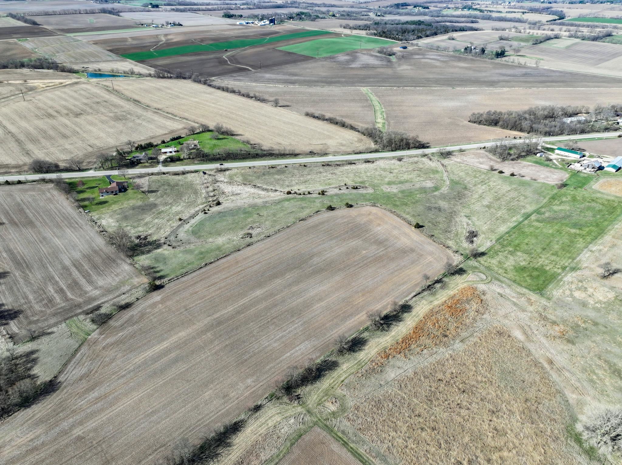 88-xx 88-xx Trask Bridge Road Rockton, IL 61072 - Photo 7 of 39 a view of a dry yard with a barn