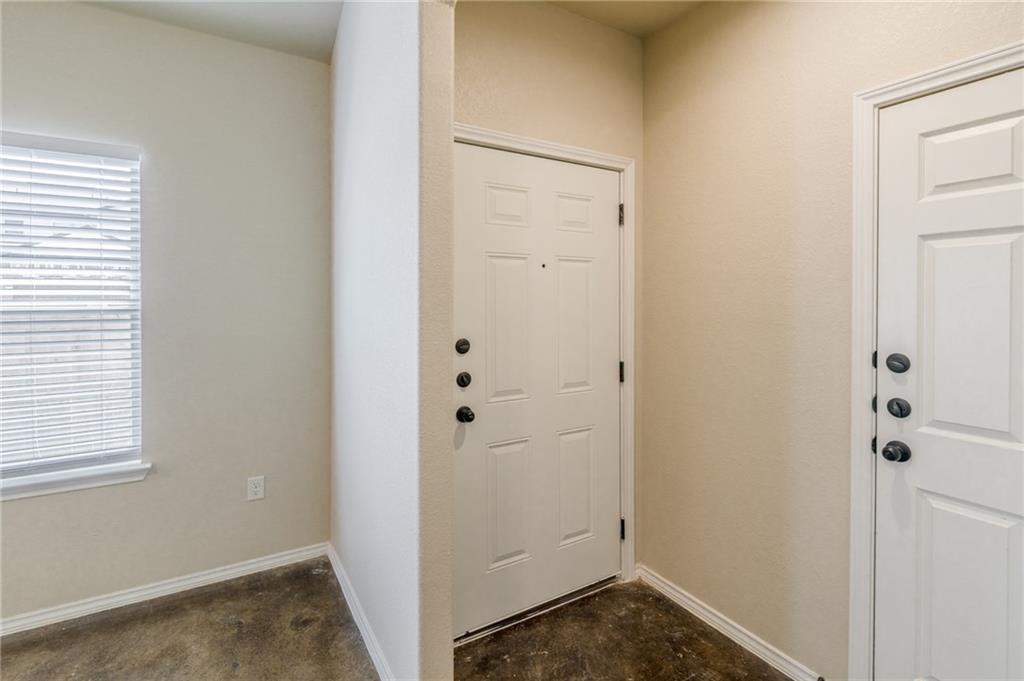 153 Samuel Drive, Unit B Buda, TX 78610 - Photo 20 of 28 a view of small space with wooden floor