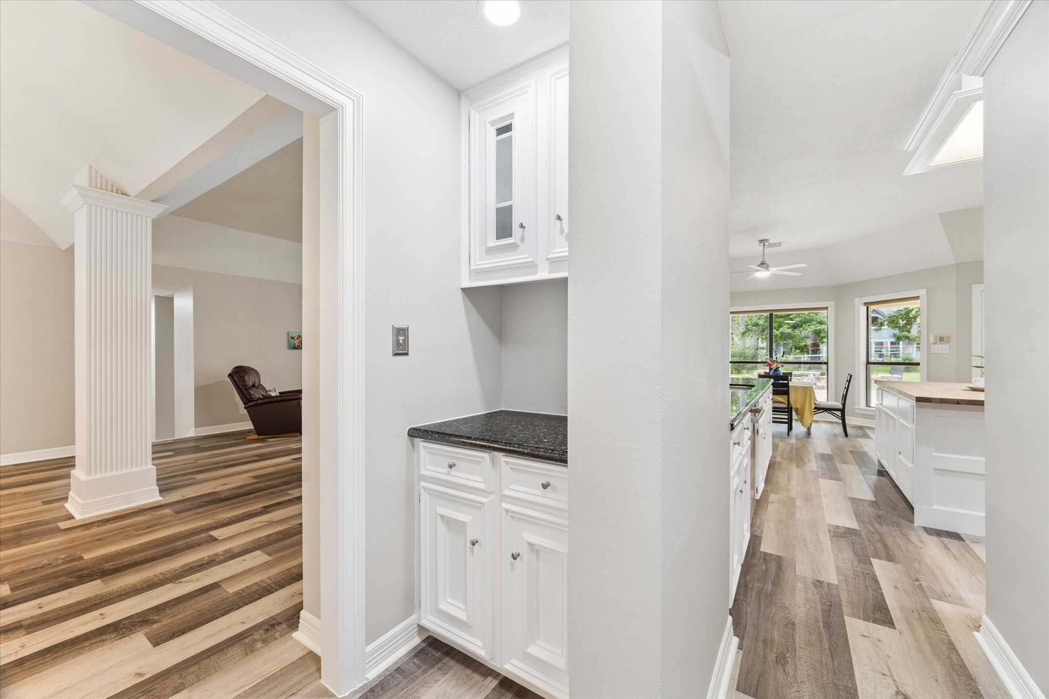23818 Pin Oak Drive Spring, TX 77389 - Photo 18 of 31 Convenient built-in nook just off the kitchen—ideal as a coffee station, serving bar, or extra storage space.
