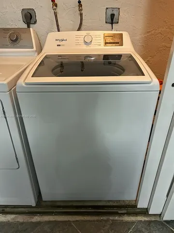 a view of utility room with sink